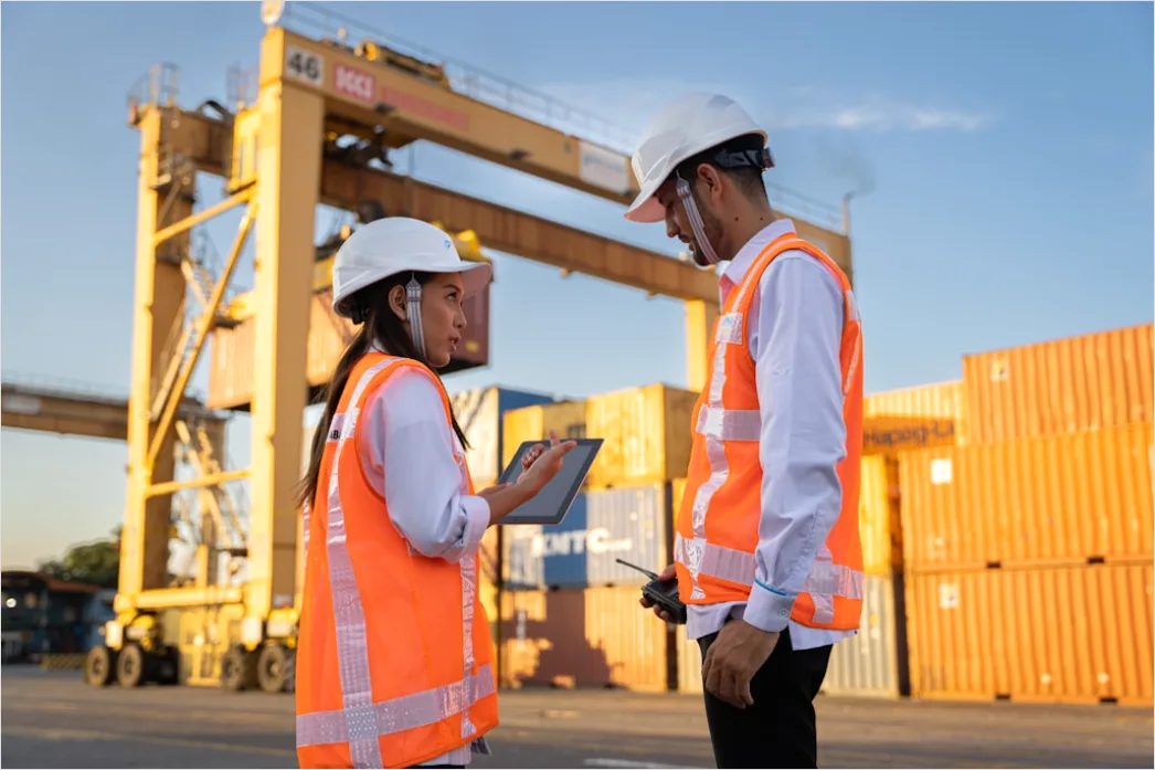Detail Logistics Worker Loading Truck At Dock Number 16