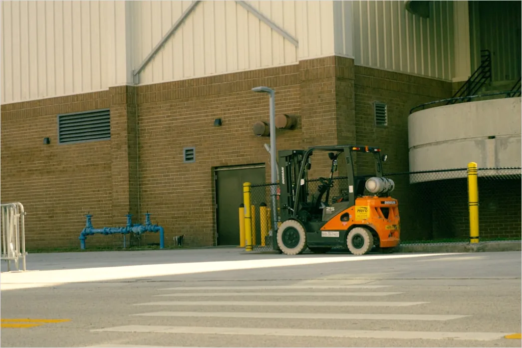 Detail Logistics Worker Loading Truck At Dock Number 17