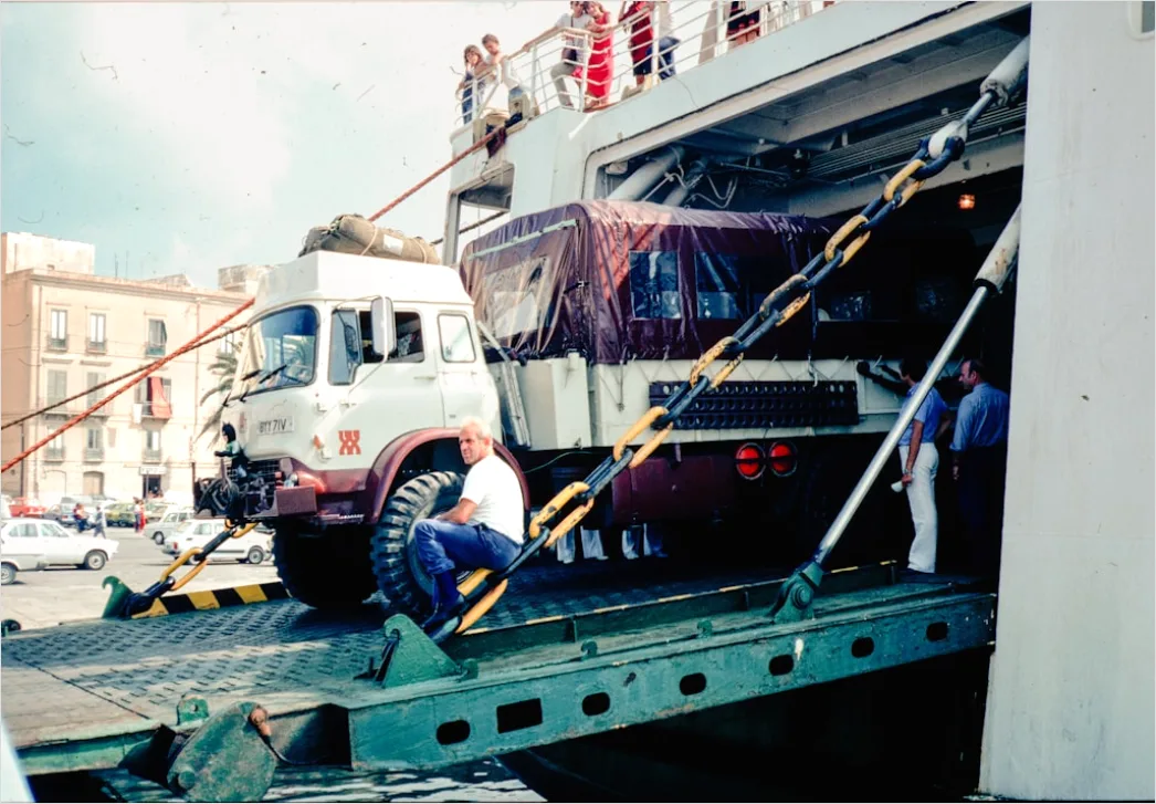 Detail Logistics Worker Loading Truck At Dock Number 18