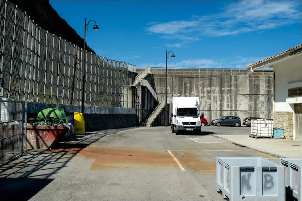 Detail Logistics Worker Loading Truck At Dock Number 19