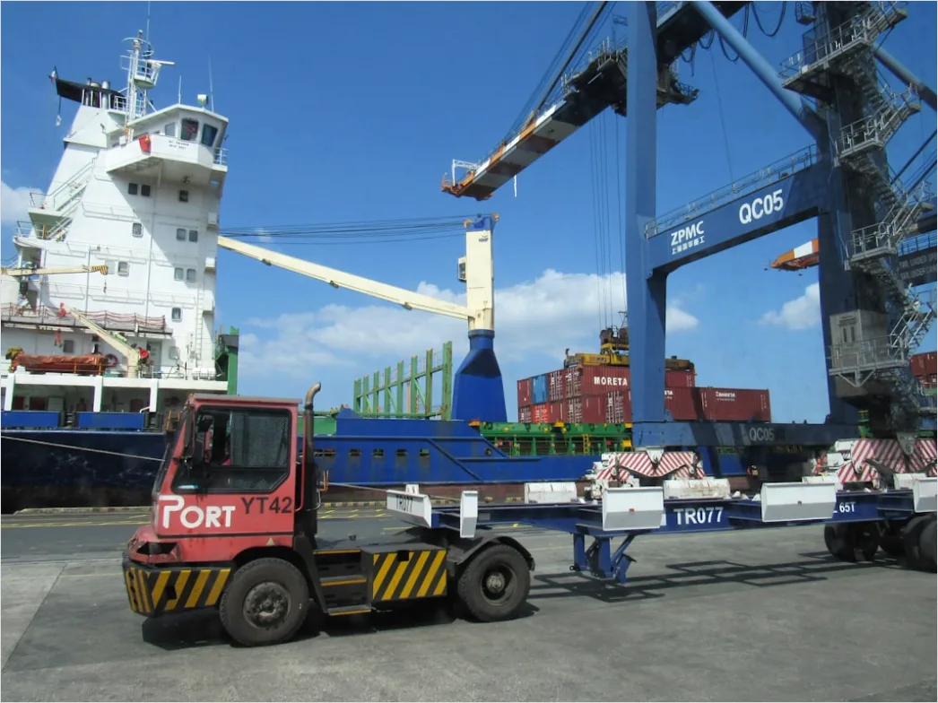 Detail Logistics Worker Loading Truck At Dock Number 3