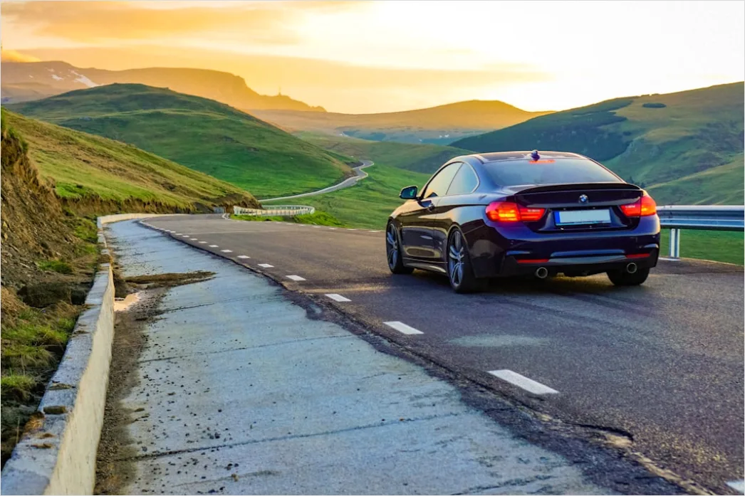 Luxury Sports Car On Mountain Road Sunset 3667