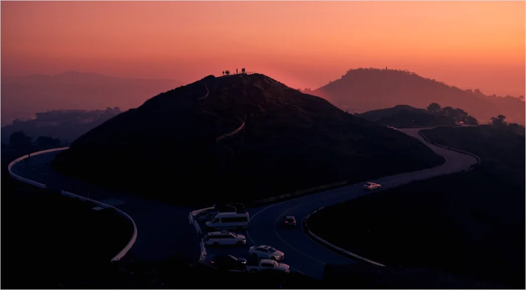 Detail Luxury Sports Car On Mountain Road Sunset Number 13
