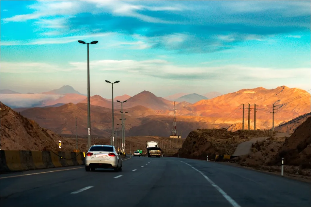 Detail Luxury Sports Car On Mountain Road Sunset Number 15
