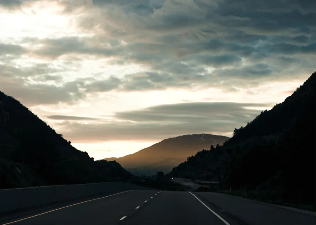 Detail Luxury Sports Car On Mountain Road Sunset Number 16