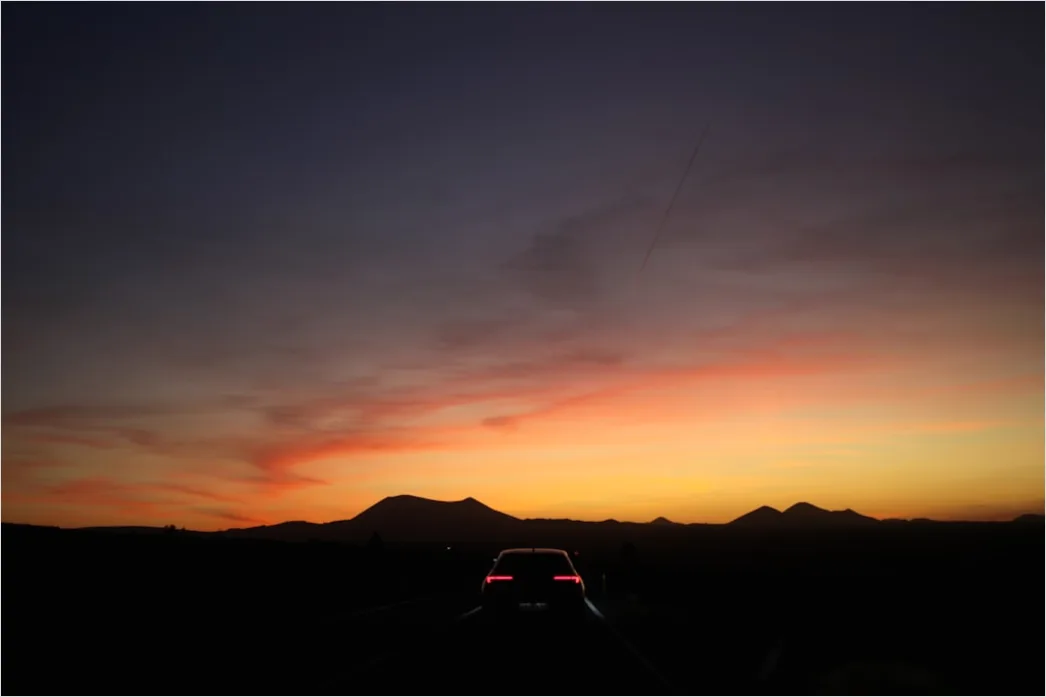 Detail Luxury Sports Car On Mountain Road Sunset Number 18