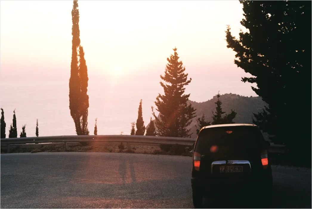 Detail Luxury Sports Car On Mountain Road Sunset Number 4