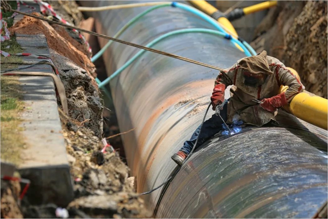 Detail Natural Gas Pipeline Construction Workers Laying Pipe Number 2