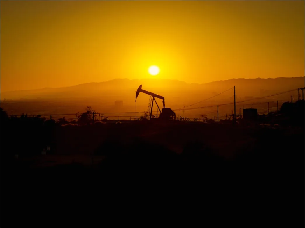 Oil Pump Jack Operating At Sunset Landscape 8ac7