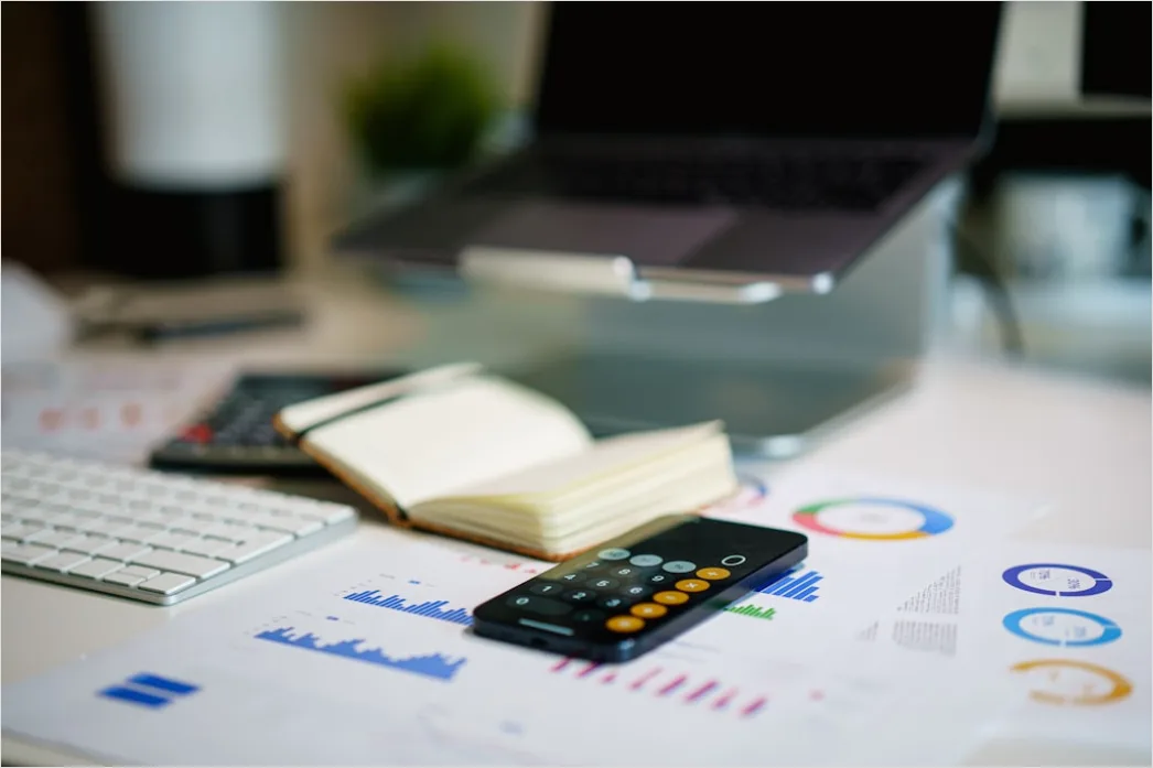 Detail Research Paper Figures And Graphs On Desk Number 12