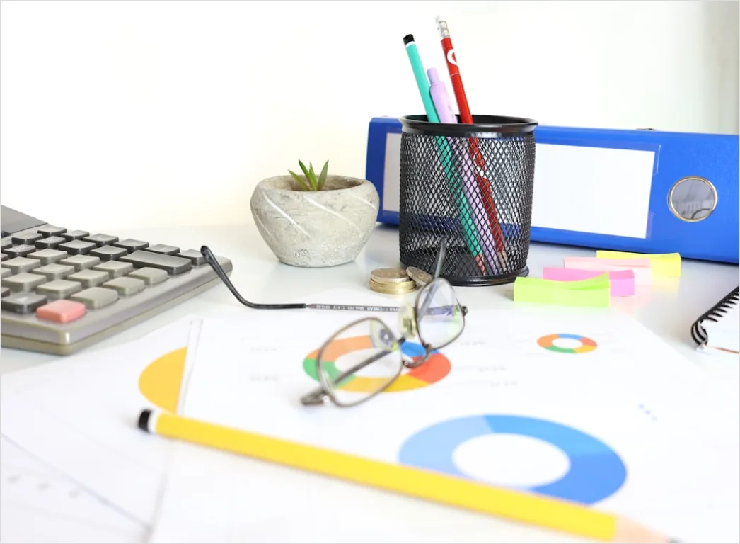 Detail Research Paper Figures And Graphs On Desk Number 14