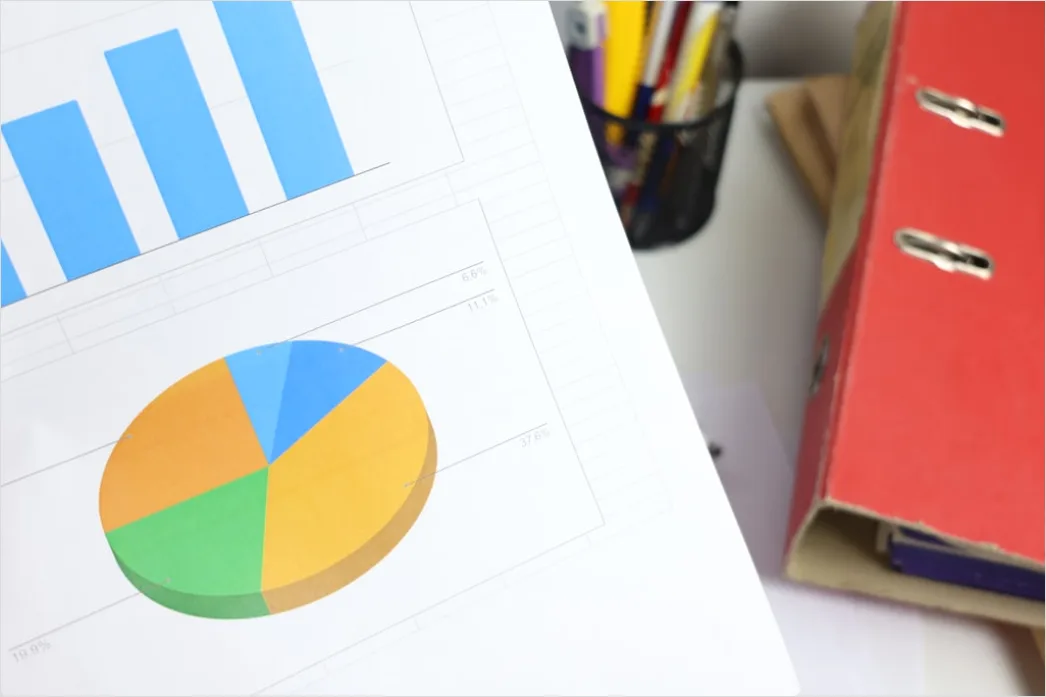 Detail Research Paper Figures And Graphs On Desk Number 6