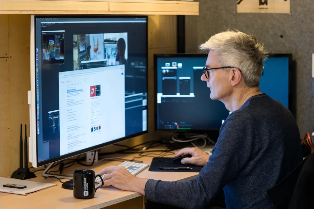 Detail Researcher Analyzing Data On Multiple Monitors Number 20