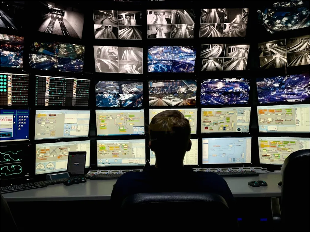 Detail Researcher Analyzing Data On Multiple Monitors Number 6
