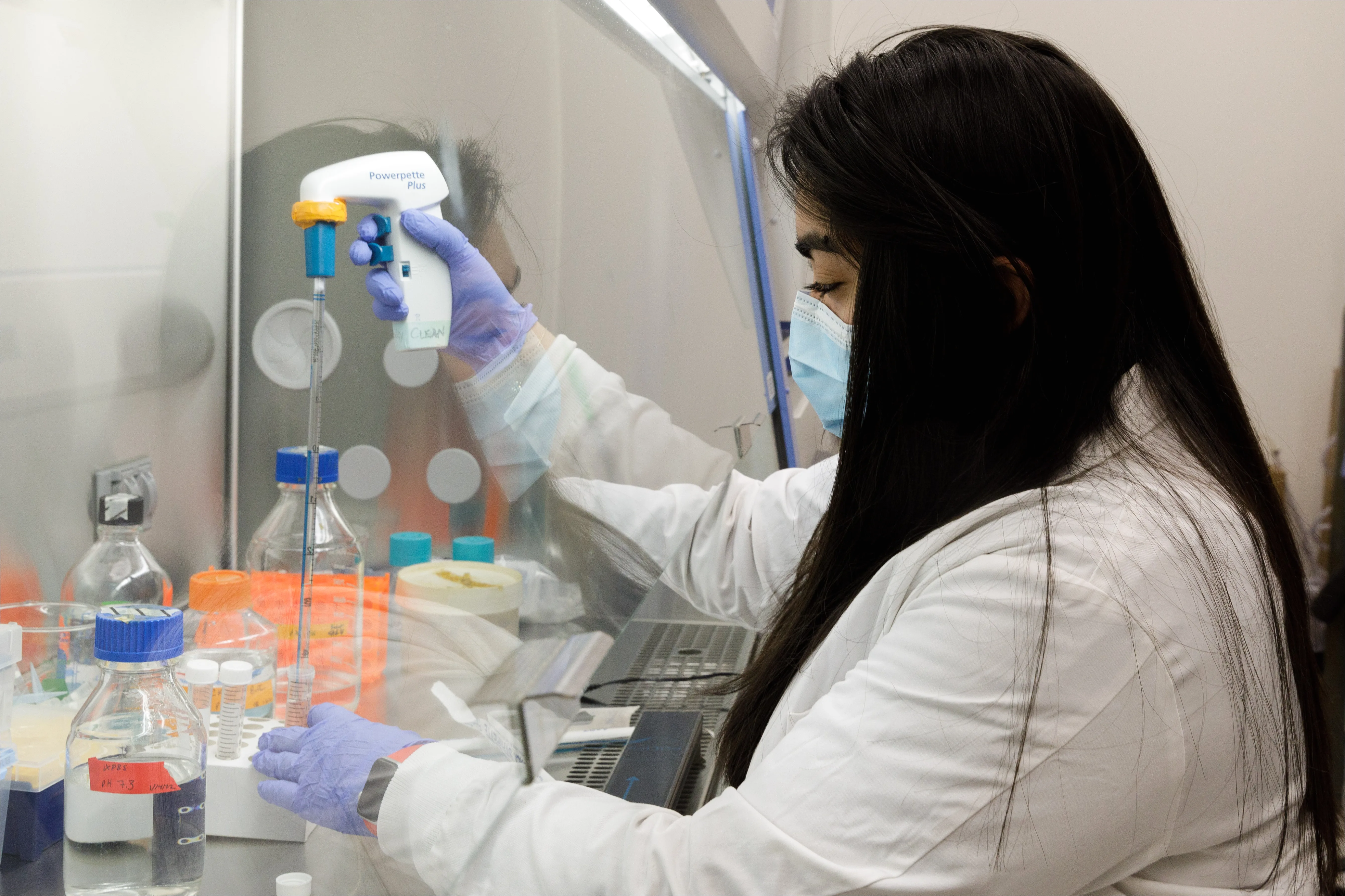 Detail Researcher Using Biosafety Cabinet In Lab Number 10