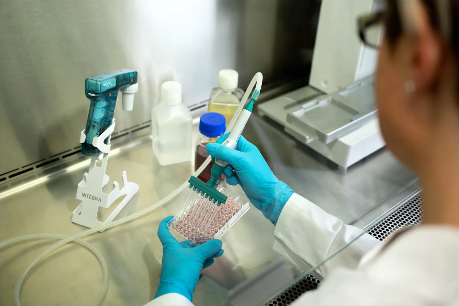 Detail Researcher Using Biosafety Cabinet In Lab Number 5