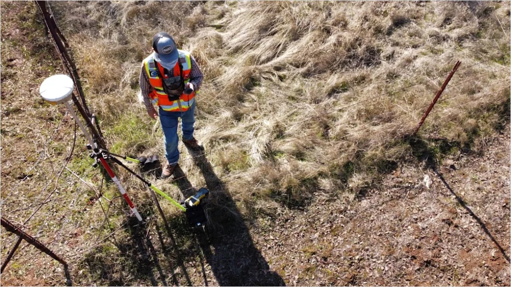 Researcher Using Gps Device In Field Study 9c02