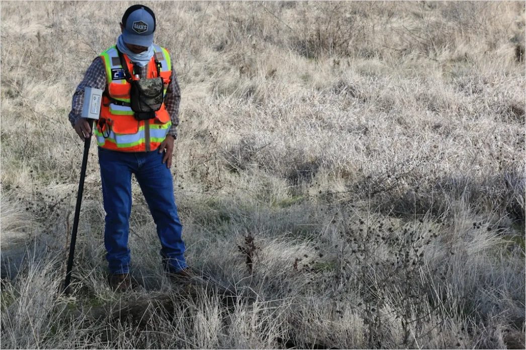 Detail Researcher Using Gps Device In Field Study Number 2