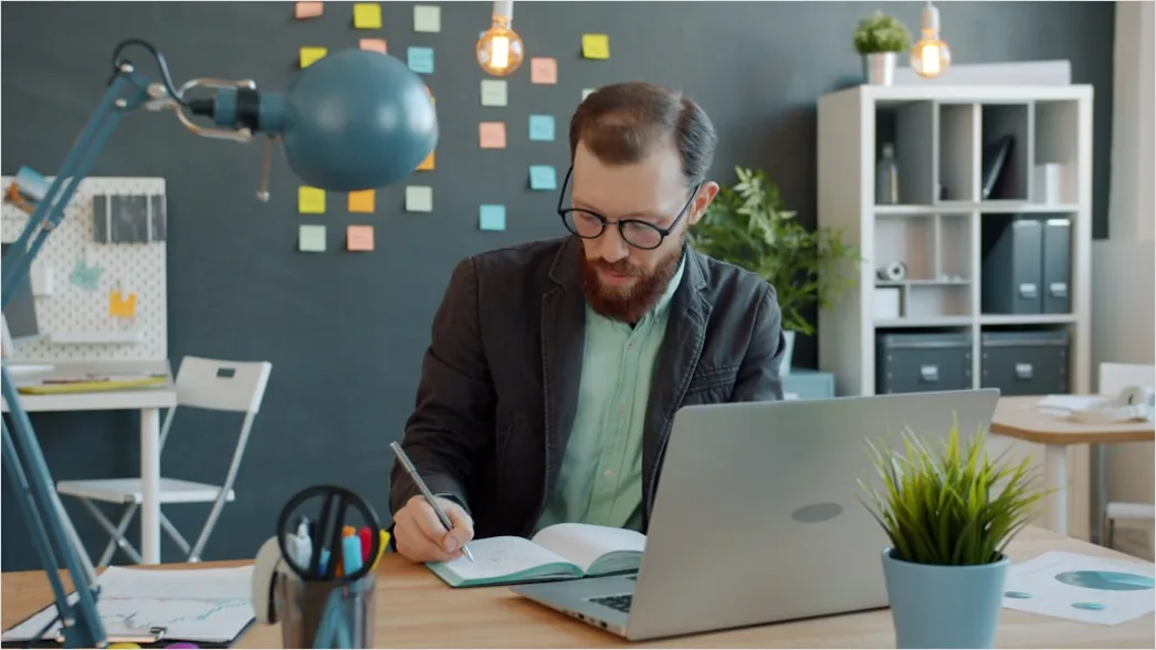 Detail Scientist Writing Manuscript In Office Workspace Number 16