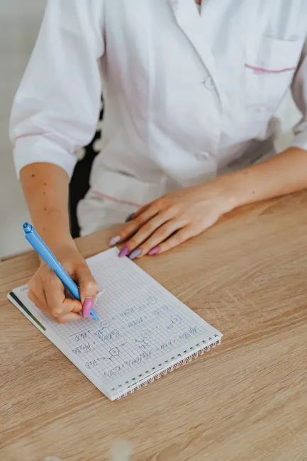 Detail Scientist Writing Notes In Lab Notebook Number 11