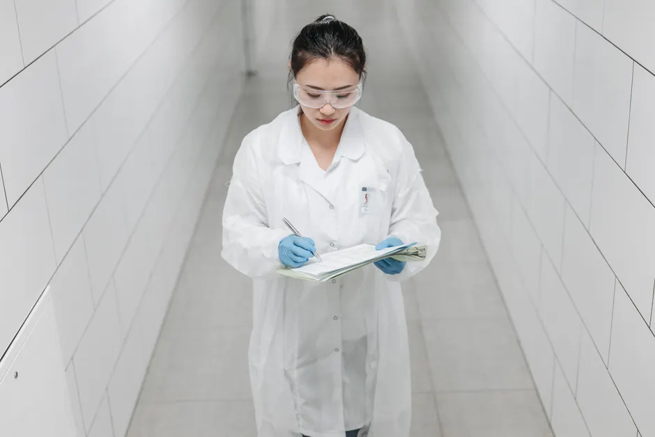 Detail Scientist Writing Notes In Lab Notebook Number 16