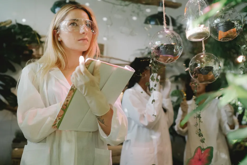 Detail Scientist Writing Notes In Lab Notebook Number 3