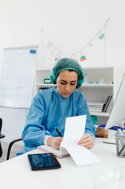 Detail Scientist Writing Notes In Lab Notebook Number 10