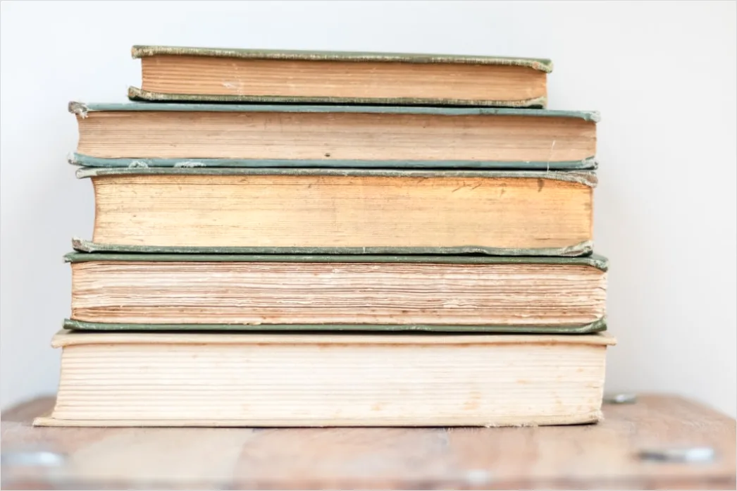 Detail Stack Of Textbooks On Table Close Up Number 5