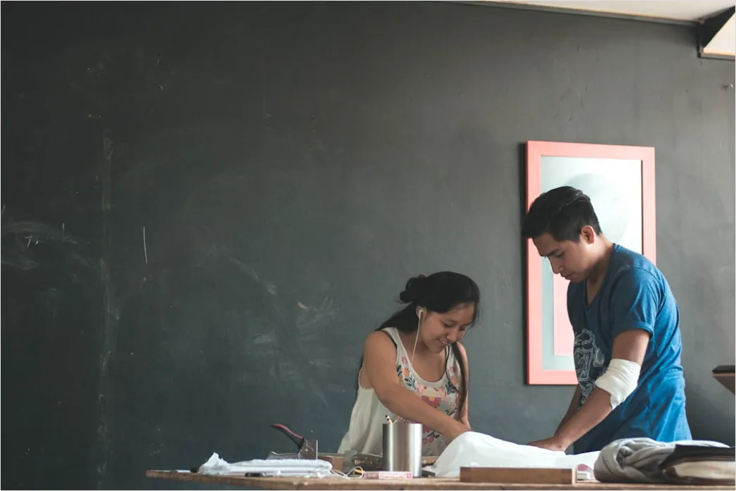 Detail Teacher And Aide Supporting Student In Class Number 8