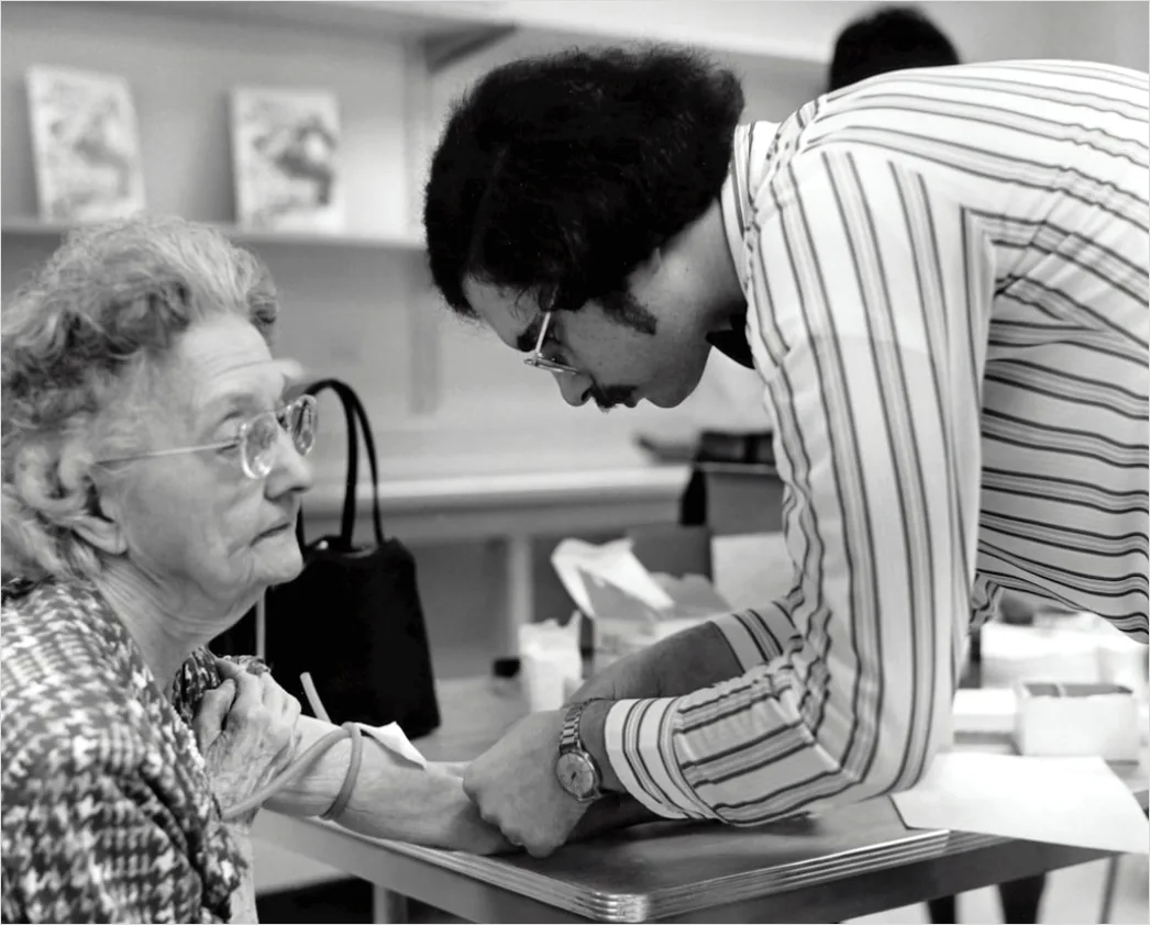 Detail Teacher And Aide Supporting Student In Class Number 10