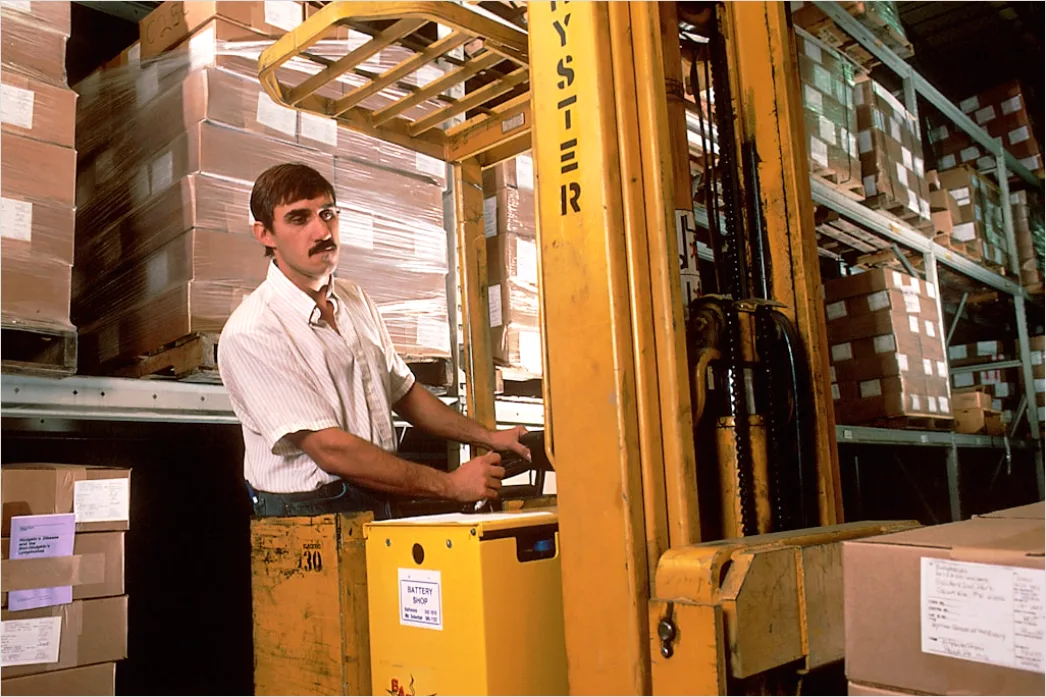 Detail Warehouse Worker Using Forklift Moving Pallets Number 4