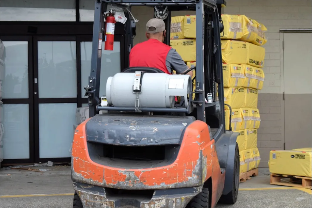 Detail Warehouse Worker Using Forklift Moving Pallets Number 5