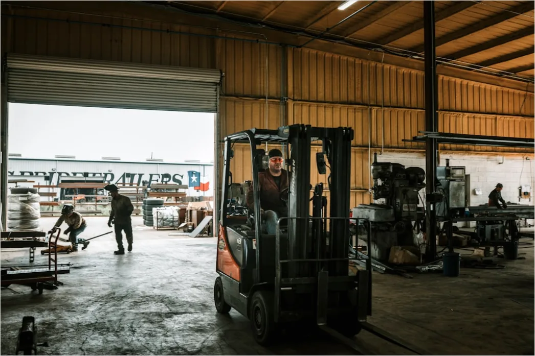Detail Warehouse Worker Using Forklift Moving Pallets Number 10