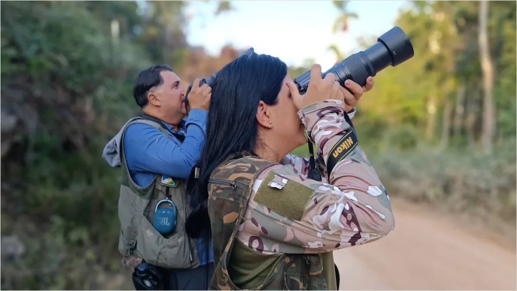Detail Wildlife Researcher Observing Animals With Binoculars Number 10