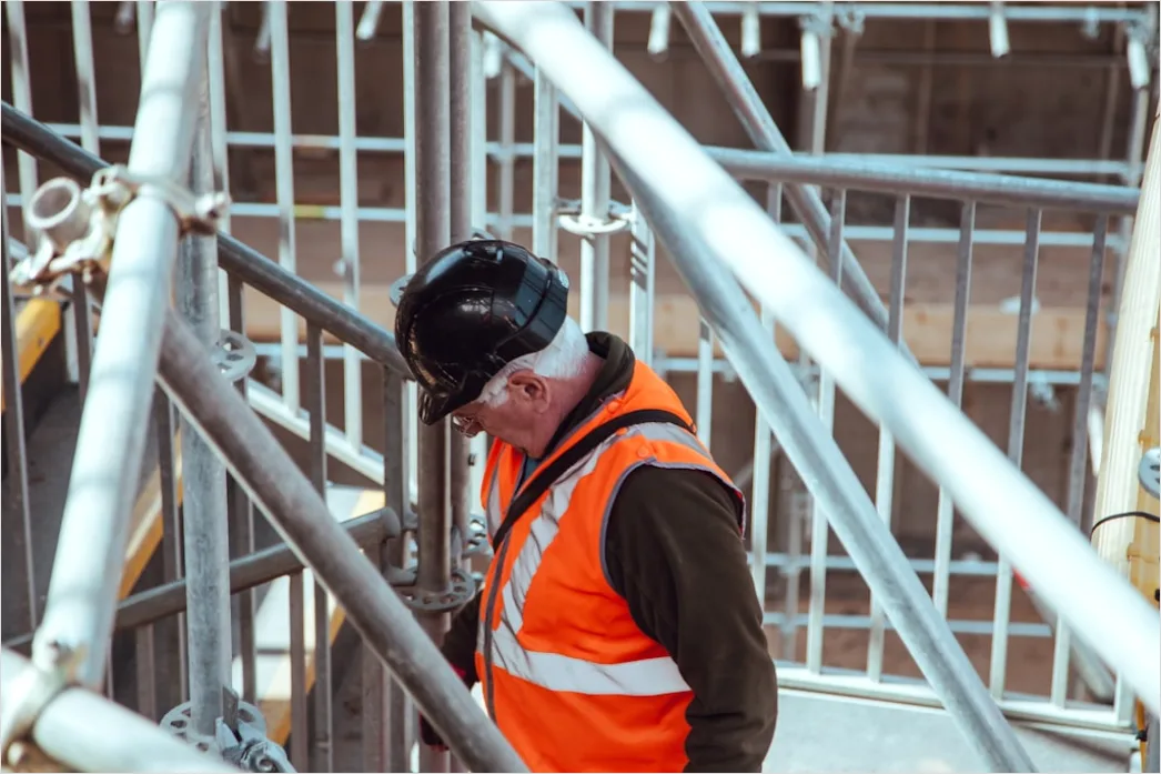 Worker Wearing Hard Hat And High Vis Vest B26f