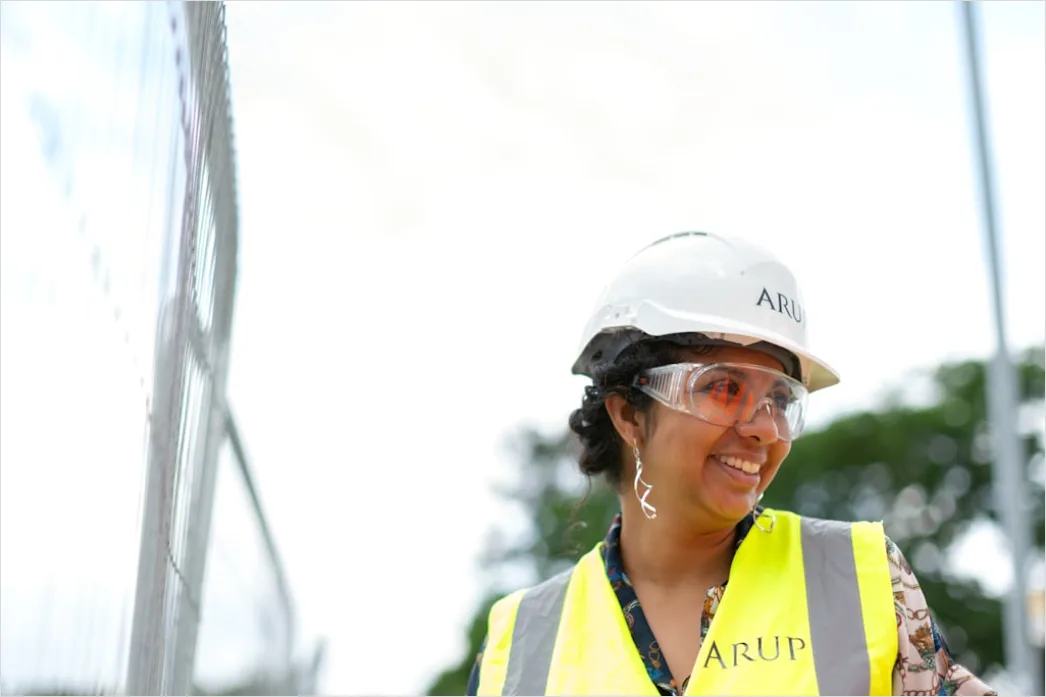 Detail Worker Wearing Hard Hat And High Vis Vest Number 14