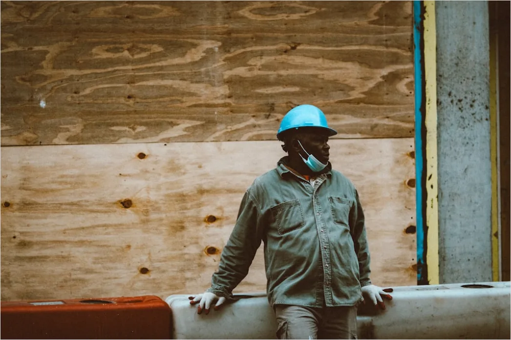 Detail Worker Wearing Hard Hat And High Vis Vest Number 15