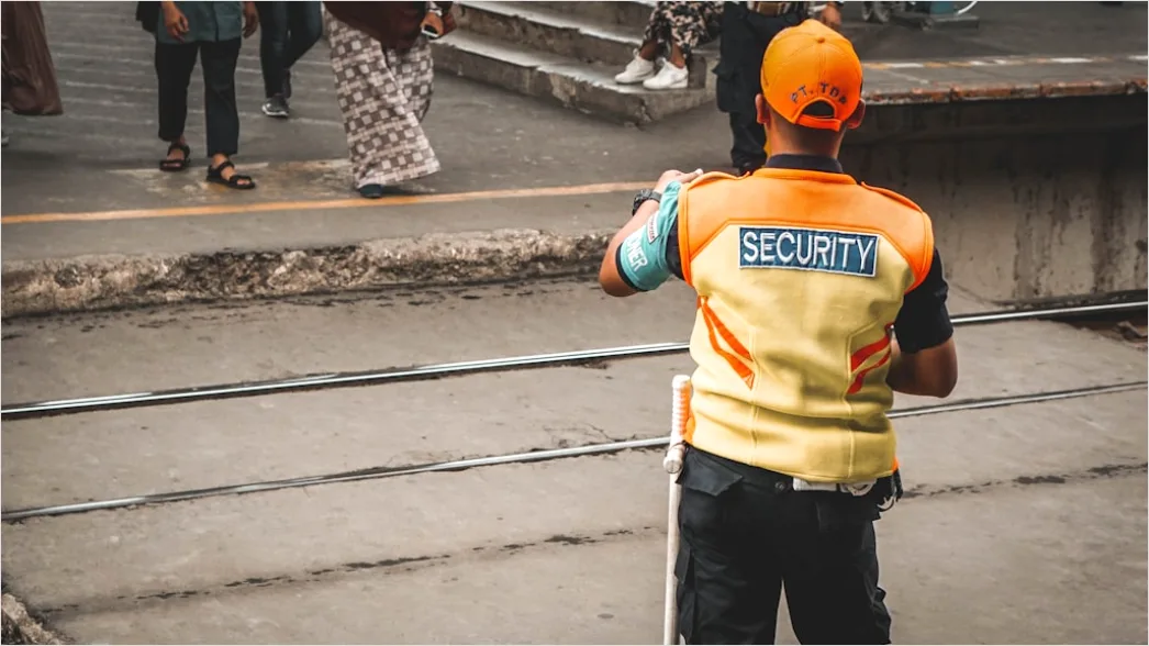 Detail Worker Wearing Hard Hat And High Vis Vest Number 17