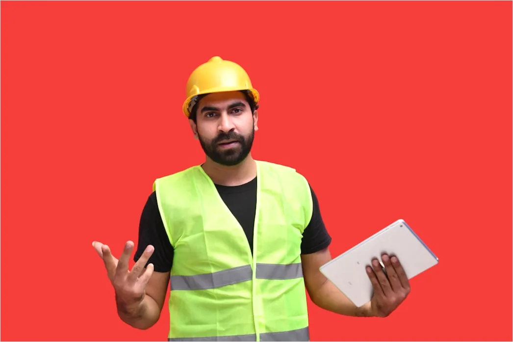 Detail Worker Wearing Hard Hat And High Vis Vest Number 18