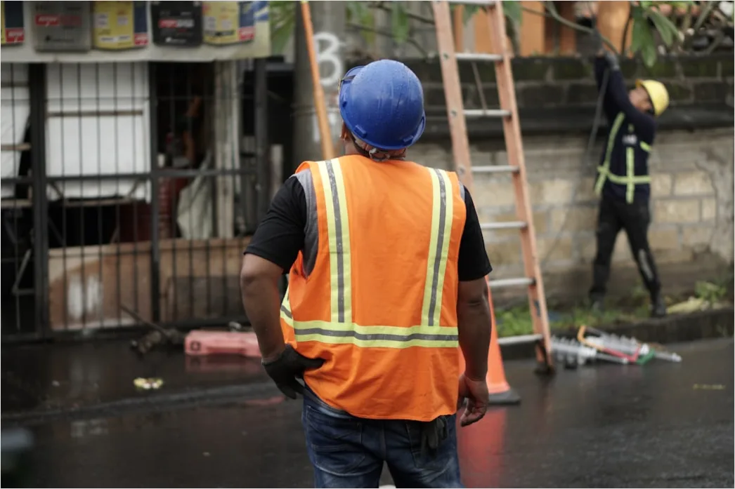Detail Worker Wearing Hard Hat And High Vis Vest Number 3