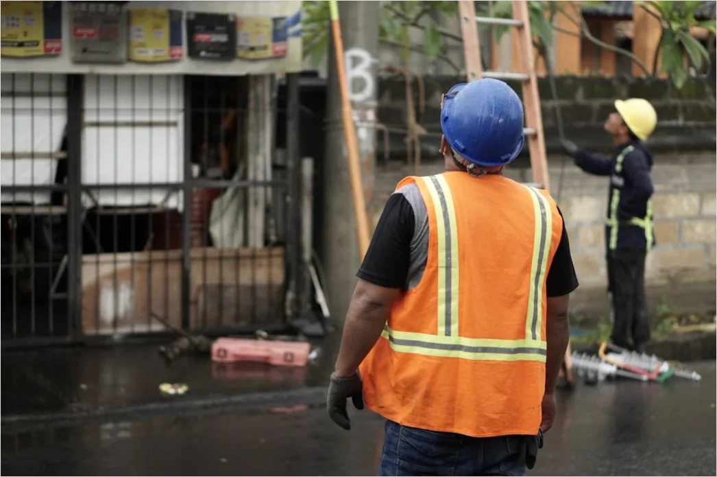 Detail Worker Wearing Hard Hat And High Vis Vest Number 4