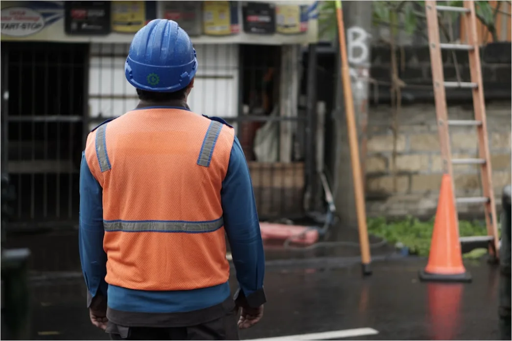 Detail Worker Wearing Hard Hat And High Vis Vest Number 8