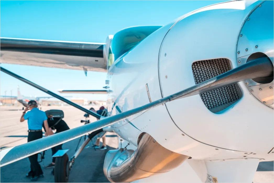 Detail Aircraft Maintenance Engineer Inspecting Engine Number 14