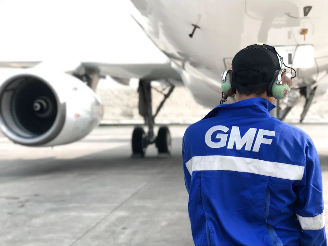 Detail Aircraft Maintenance Engineer Inspecting Engine Number 7