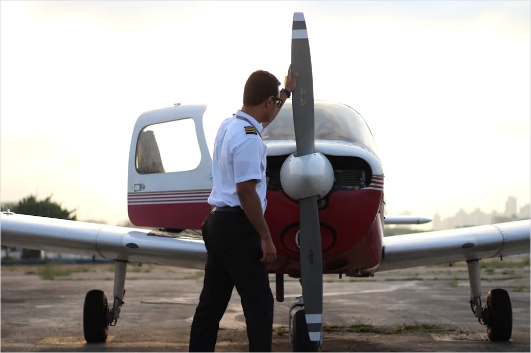 Detail Aircraft Maintenance Engineer Inspecting Engine Number 9