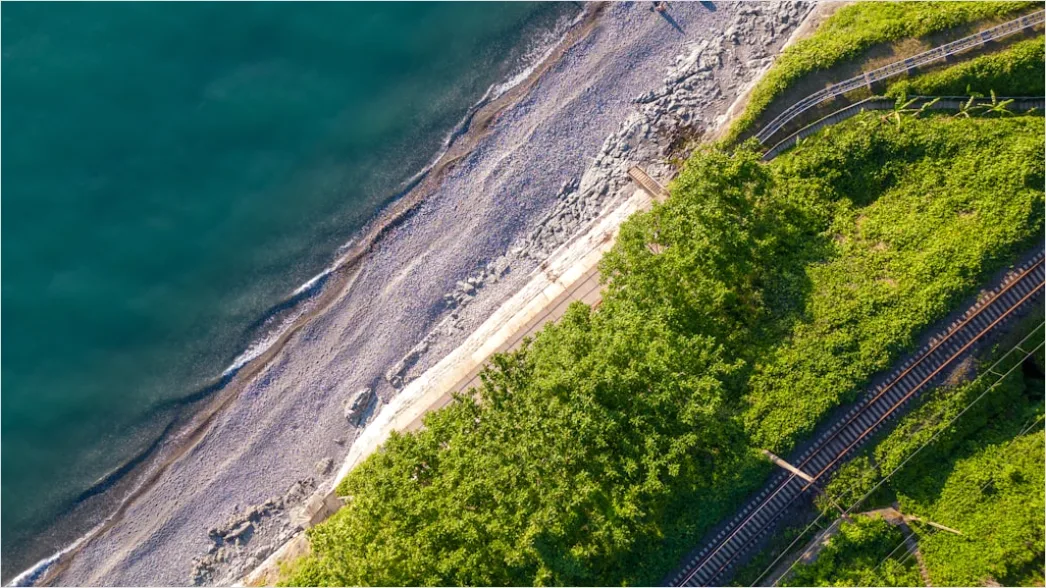 Detail Biker Riding On Coastal Road Aerial View Number 11