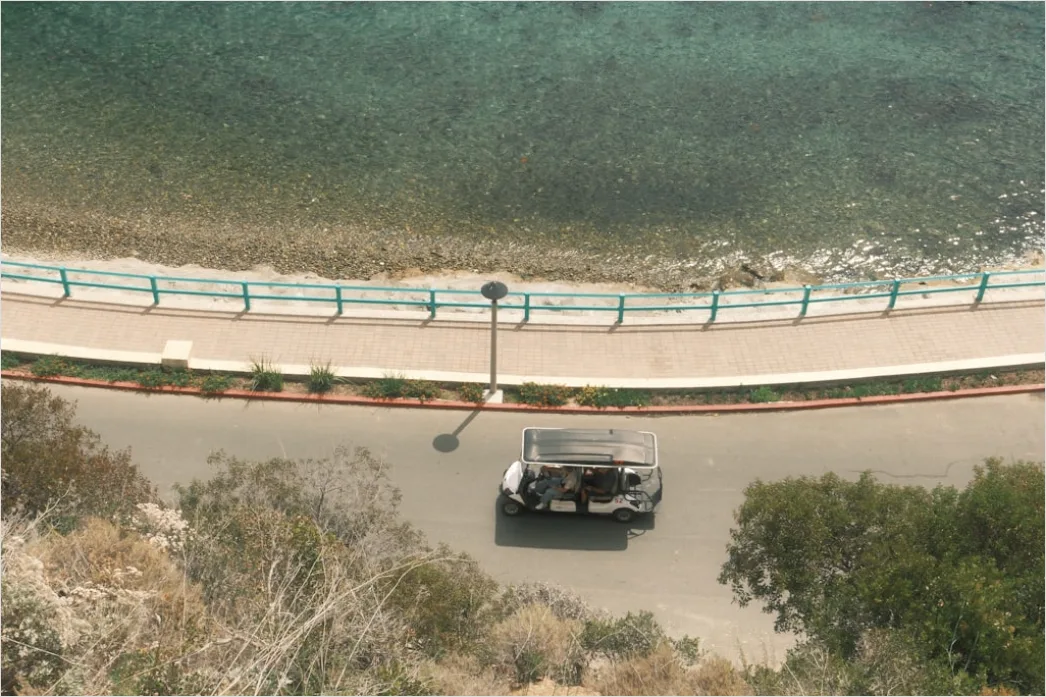 Detail Biker Riding On Coastal Road Aerial View Number 14