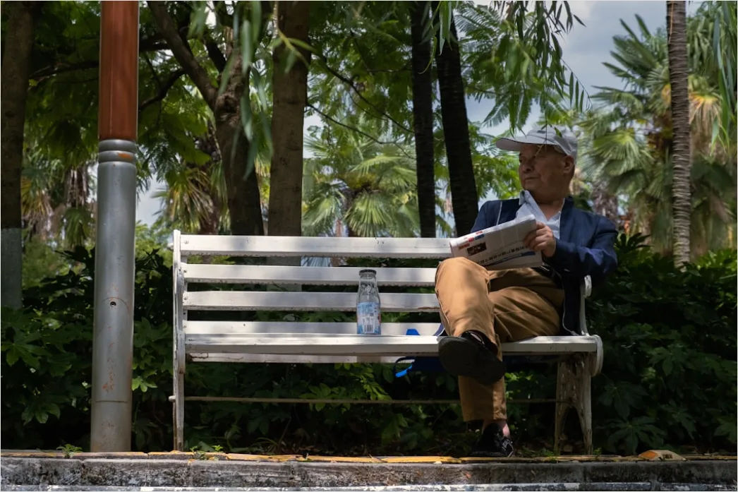 Candid Portrait Man Reading Book Park Bench Ee83