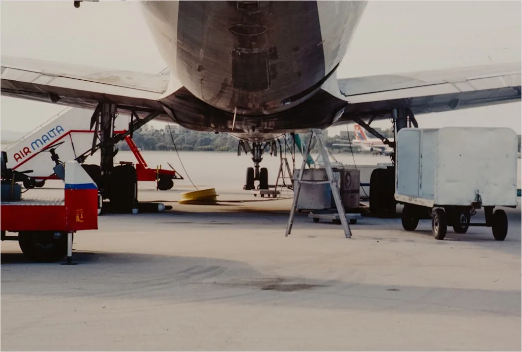 Cargo Plane Unloading Freight At Airport