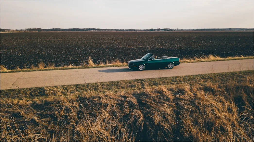Detail Classic American Muscle Car On Open Road Number 20